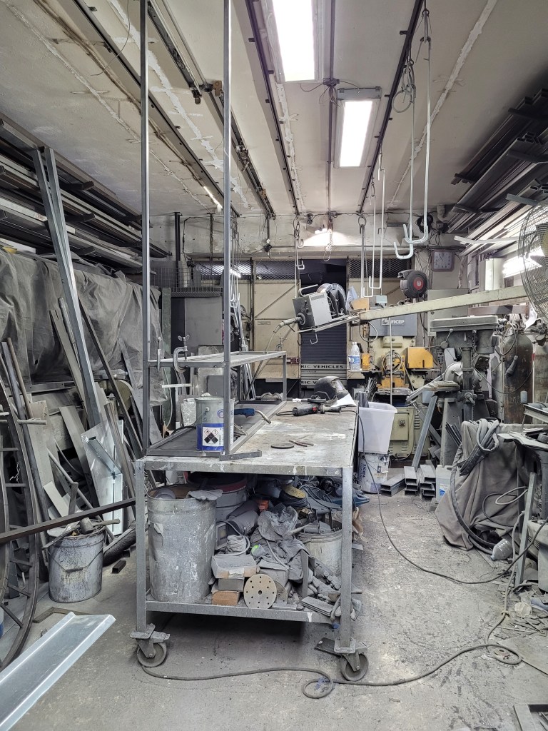 Picture of a cluttered metal work shop