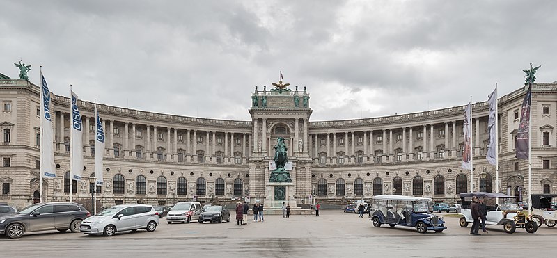 Hofburg, the past emperor palace. it would house the emperor, in this case the Habsburg. Built in the 14th century  and expanded several times afterwards. Style wise it represents the gothic architecture style, in a nutshell pointy and very complex designed.